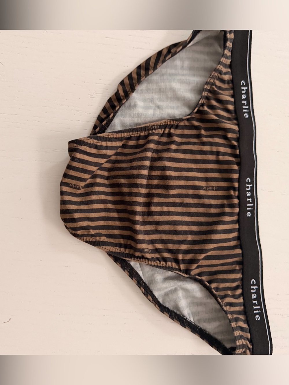 Charlie bikini brief in black and beige stripe 

Rare-Sold Out online